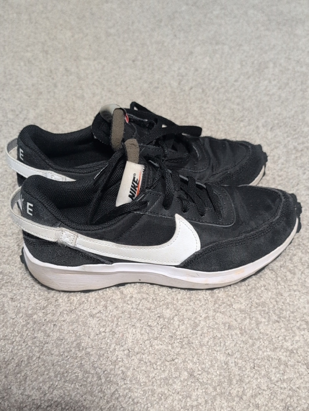 Nike Women's  Black with White Swoosh Sneakers